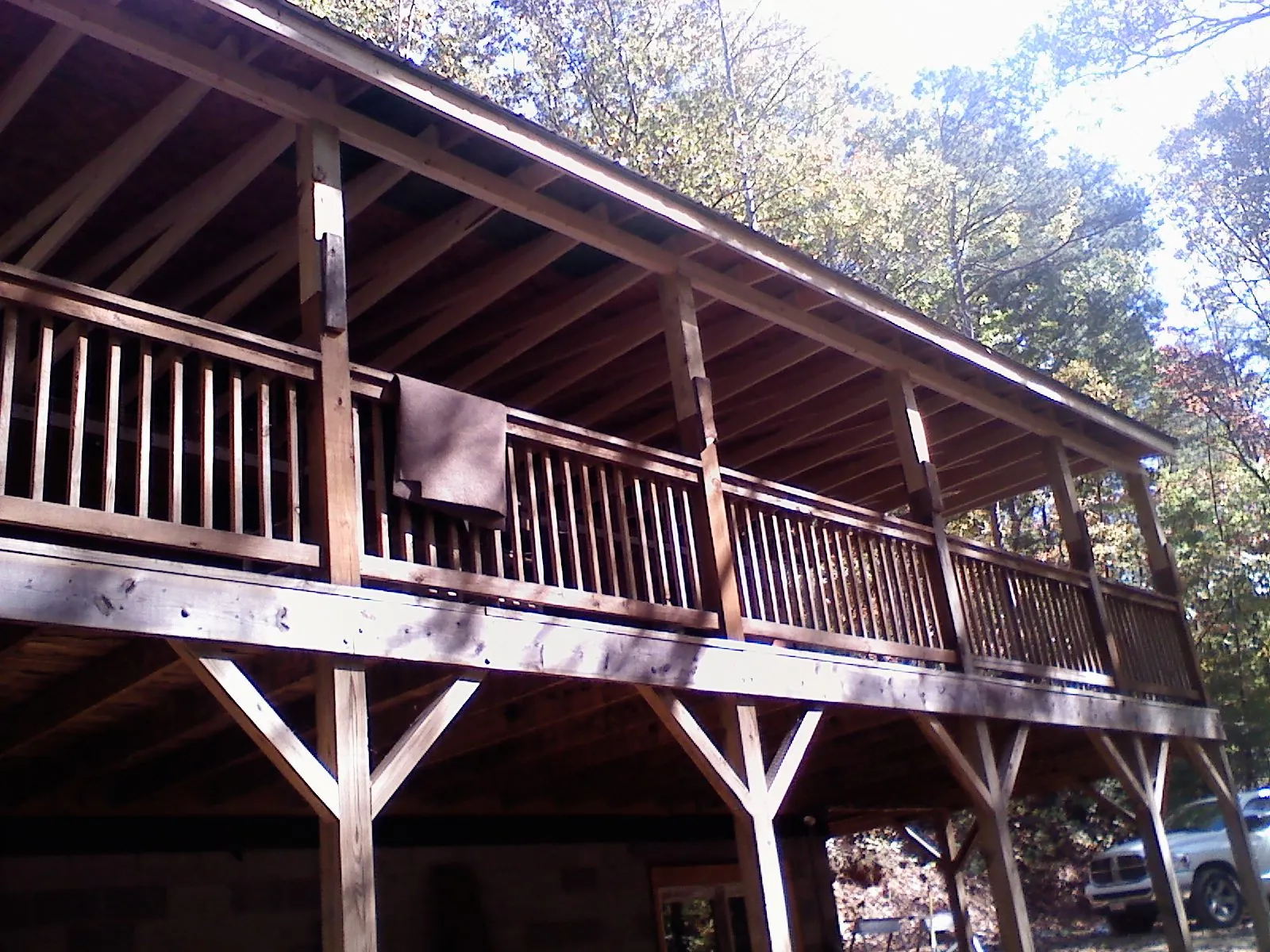 Timber framing under a new elevated porch and deck — Roof Leak Repair in East Pittsburgh by Roofing Brothers